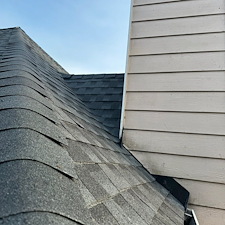 Elite-Roofing-Systems-Upgrades-Dunwoody-Home-with-GAFs-Timberline-HDZ-Architectual-Charcoal-Black-Shingles 1